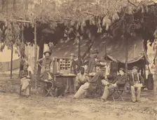 Chief Officer and Clerks of the Ambulance Department, 9th Army Corps, in Front of P..., August 1864. Creator: Tim O'Sullivan