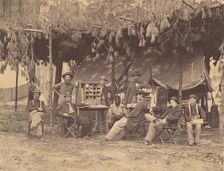 Chief Officer and Clerks of the Ambulance Department, 9th Army Corps, in Front of P..., August 1864. Creator: Tim O'Sullivan