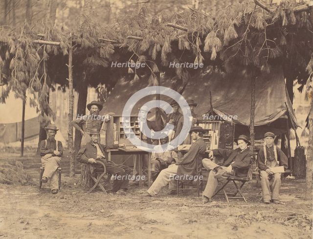 Chief Officer and Clerks of the Ambulance Department, 9th Army Corps, in Front of P..., August 1864. Creator: Tim O'Sullivan.