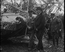 Chief Marshal Sir John Salmond and Other British Officials Walking Around the Wreckage..., 1930. Creator: British Pathe Ltd