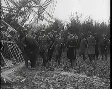 Chief Marshal Sir John Salmond and Other British Officials Walking Around the Wreckage..., 1930. Creator: British Pathe Ltd