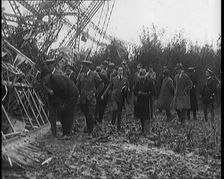 Chief Marshal Sir John Salmond and Other British Officials Walking Around the Wreckage..., 1930. Creator: British Pathe Ltd