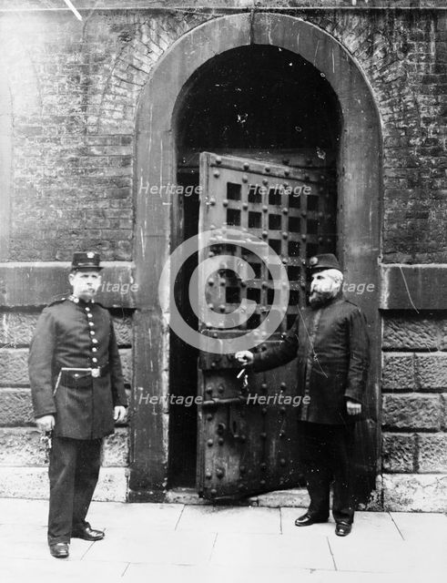 Chief Warder and his assistant at the inner door of Newgate Prison, London. Artist: Unknown