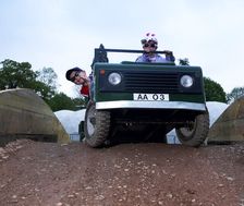 Child driving a toy Land Rover
