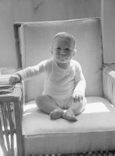 Child of Mrs. Carl Muschenheim, portrait photograph, 1933 Aug. Creator: Arnold Genthe