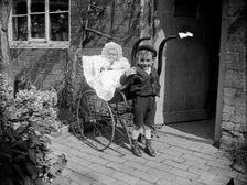 Child with a baby in a pram, Hellidon, Northamptonshire, 1900. Artist: A Newton