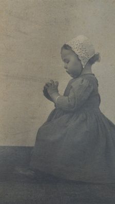 Child with apple, c1900. Creator: Ema Spencer