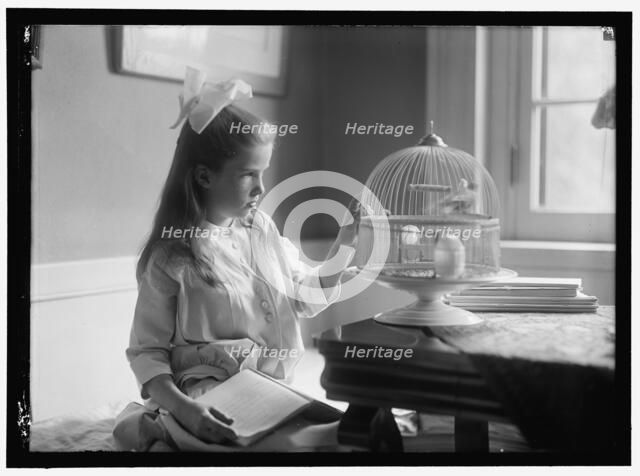 Child with birdcage, between 1910 and 1917. Creator: Harris & Ewing.