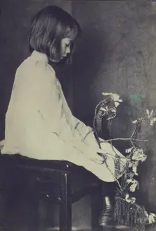 Child with oak branch, c1900. Creator: Eva Watson-Schutze