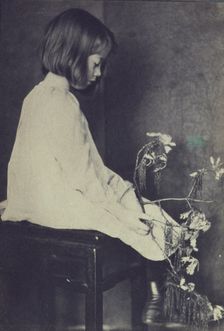 Child with oak branch, c1900. Creator: Eva Watson-Schutze