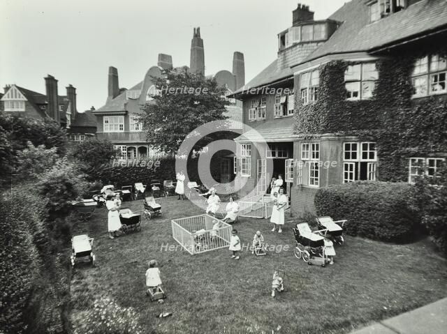 Children and carers in a garden, Hampstead, London, 1960. Artist: Unknown.