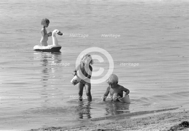 Children bathing in the Öresund, Bostahusen, Landskrona, Sweden 1966. Artist: Unknown