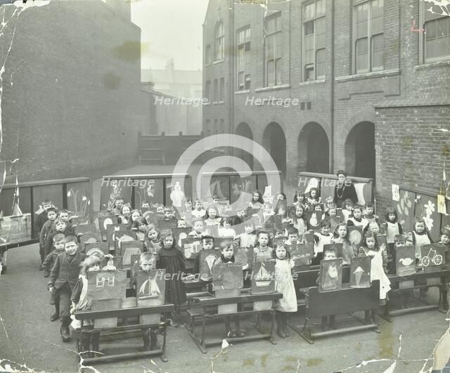 Children displaying their drawings, Flint Street School, Southwark, London, 1908. Artist: Unknown.