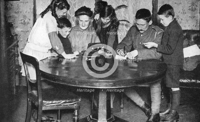 Children emptying their money boxes to invest in war bonds, 1936. Artist: Unknown