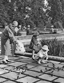 Children feeding the sparrows in Hyde Park, London, 1926-1927