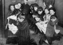 Children in a communal kitchen, London, 1917 (1936)