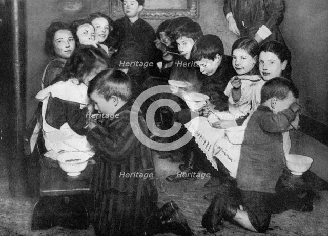 Children in a communal kitchen, London, 1917 (1936). Artist: Unknown