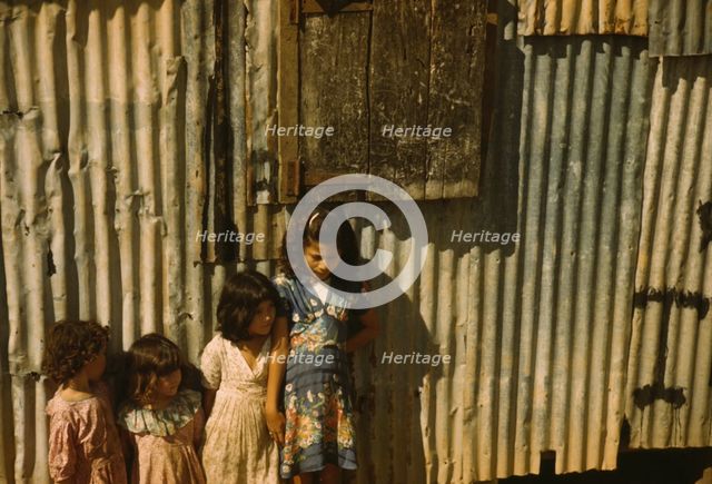 Children in a company housing settlement, Puerto Rico, 1941. Creator: Jack Delano.