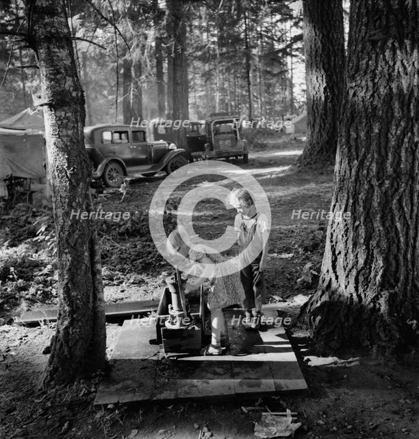 Children in large private bean pickers camp, near West Stayton, Marion County, Oregon, 1939. Creator: Dorothea Lange.