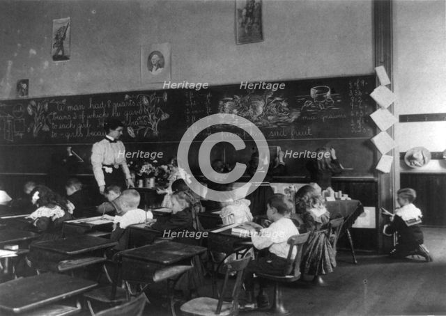 Children in school in Washington, D.C. - studying mathematics, (1899?). Creator: Frances Benjamin Johnston.