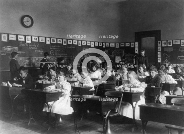 Children in school in Washington, D.C. - studying geometry, (1899?). Creator: Frances Benjamin Johnston.