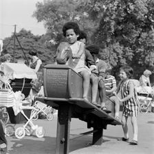 Children on a rocking horse, Clissold Park, Stoke Newington, London, 1962-1964. Creator: John Gay