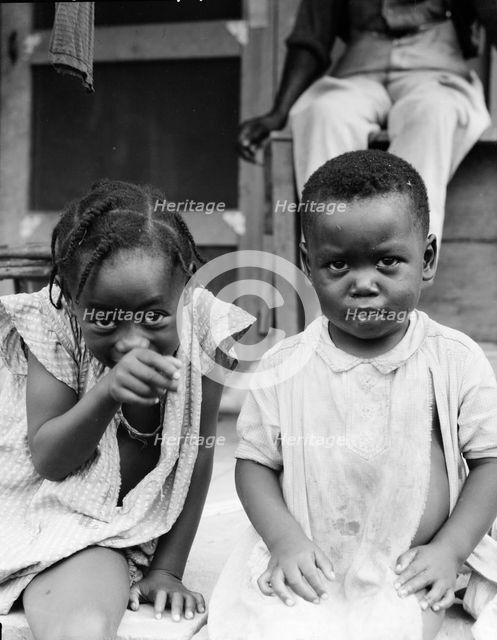 Children of evicted sharecropper, now living on Sherwood Eddy cooperative plantation, 1936. Creator: Dorothea Lange.