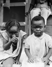 Children of evicted sharecropper, now living on Sherwood Eddy cooperative plantation, 1936. Creator: Dorothea Lange