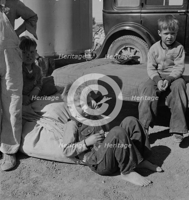 Children of Oklahoma migrants, near Calipatria, California, 1937. Creator: Dorothea Lange.