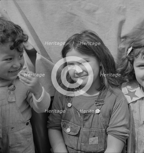 Children of migratory carrot pullers, Mexicans, Imperial Valley, California, 1937. Creator: Dorothea Lange.