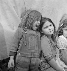 Children of migratory carrot pullers, Mexicans, Imperial Valley, California, 1937. Creator: Dorothea Lange