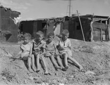 Children of migrant cotton field workers from Sweetwater, Oklahoma, 1937. Creator: Dorothea Lange