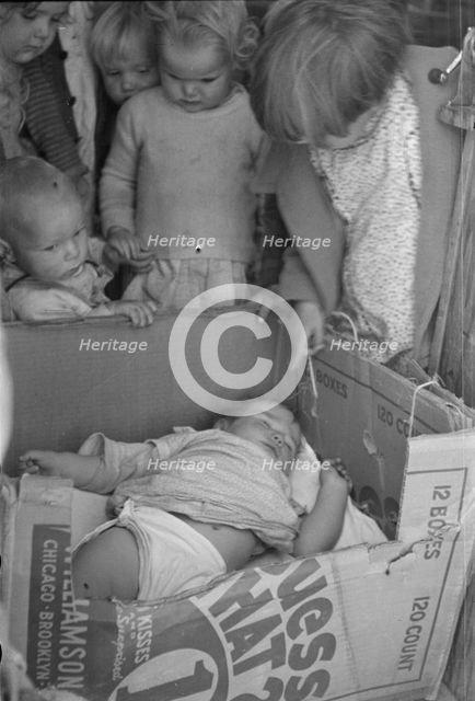 Children of migrant families in the nursery school, Kern migrant camp, California, 1936. Creator: Dorothea Lange.