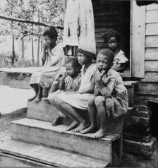 Children of turpentine worker near Cordele, Alabama, 1936. Creator: Dorothea Lange