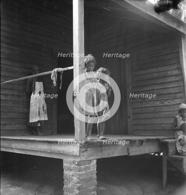 Children of turpentine worker near Cordele, Alabama, 1936. Creator: Dorothea Lange.