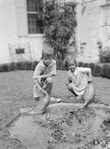 Children of Victor Harris, outdoors, 1932. Creator: Arnold Genthe