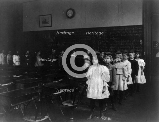 Children marching around the classroom, Washington, D.C., (1899?). Creator: Frances Benjamin Johnston.