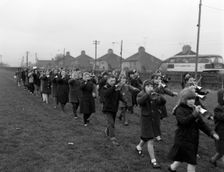 Children marching with home made bugles, Middlesborough, Teesside,1964. Creator: Michael Walters