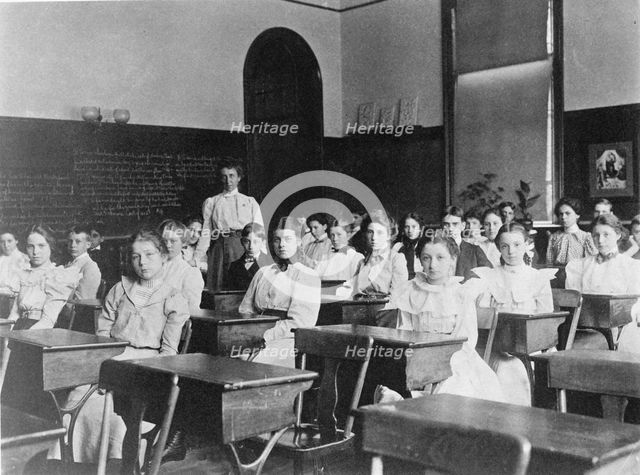 Children seated in classroom, Washington, D.C., (1899?). Creator: Frances Benjamin Johnston.