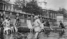 Children paddling in the fountains at Trafalgar Square, London, 1926-1927. Artist: Whiffin