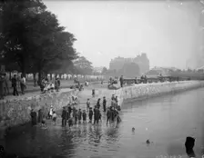 Children play ducks and drakes in the River Itchen, Southampton, Hampshire, c1878. Artist: Henry Taunt