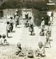 Children playing hopscotch, Kashmir, India, c1900s(?).Artist: Underwood & Underwood