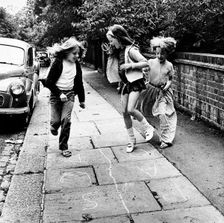 Children playing hopscotch on a London street, c1970. Creator: Henry Grant