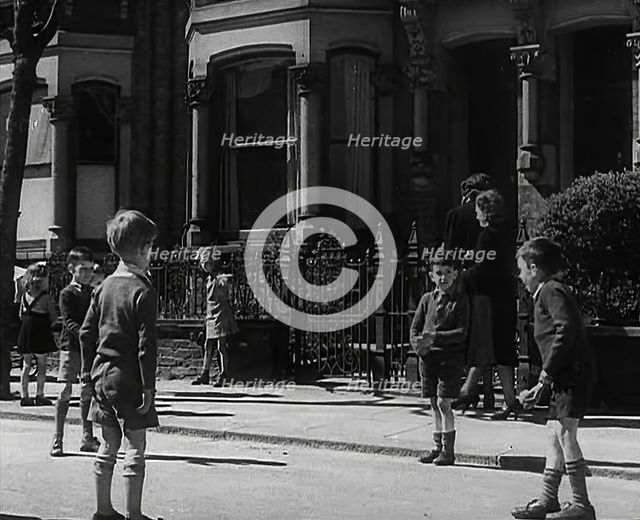 Children Playing in the Street, 1942. Creator: British Pathe Ltd.
