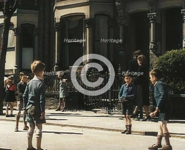 Children Playing in the Street, 1942. Creator: British Pathe Ltd.