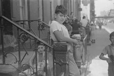 Children playing in the street, 61st Street between 1st and 3rd Avenues, 1938. Creator: Walker Evans
