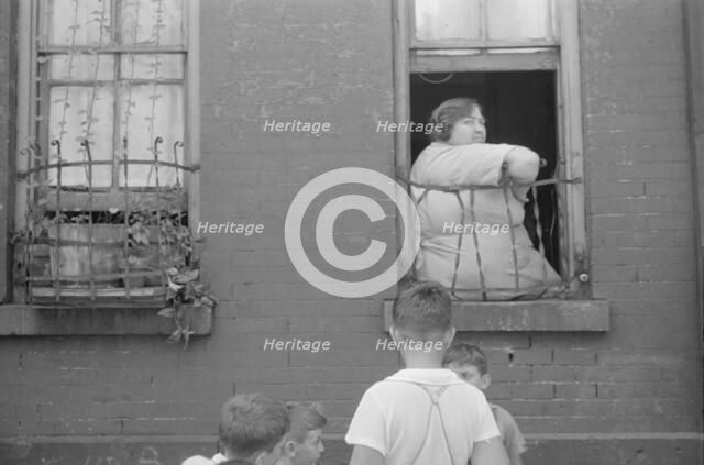 Children playing in the street, 61st Street between 1st and 3rd Avenues, New York, 1938. Creator: Walker Evans.