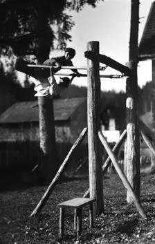 Children playing on a climbing frame, Bistrita Valley, Moldavia, north-east Romania, c1920-c1945. Artist: Adolph Chevalier