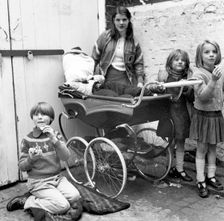 Children playing Penny for the Guy in a London yard, Oct 1978. Creator: Henry Grant