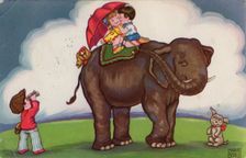 Children riding on an elephant, 1932. Creator: Margret Boriss